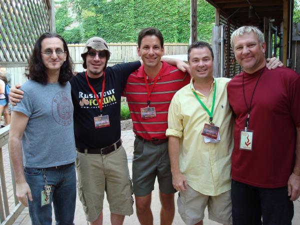 me and rush I'm the one in the middle, my brother is in the crazy hat, and my buddy Steve is in the yellow shirt. The other 2 are Geddy and Alex from The Rock band "RUSH"